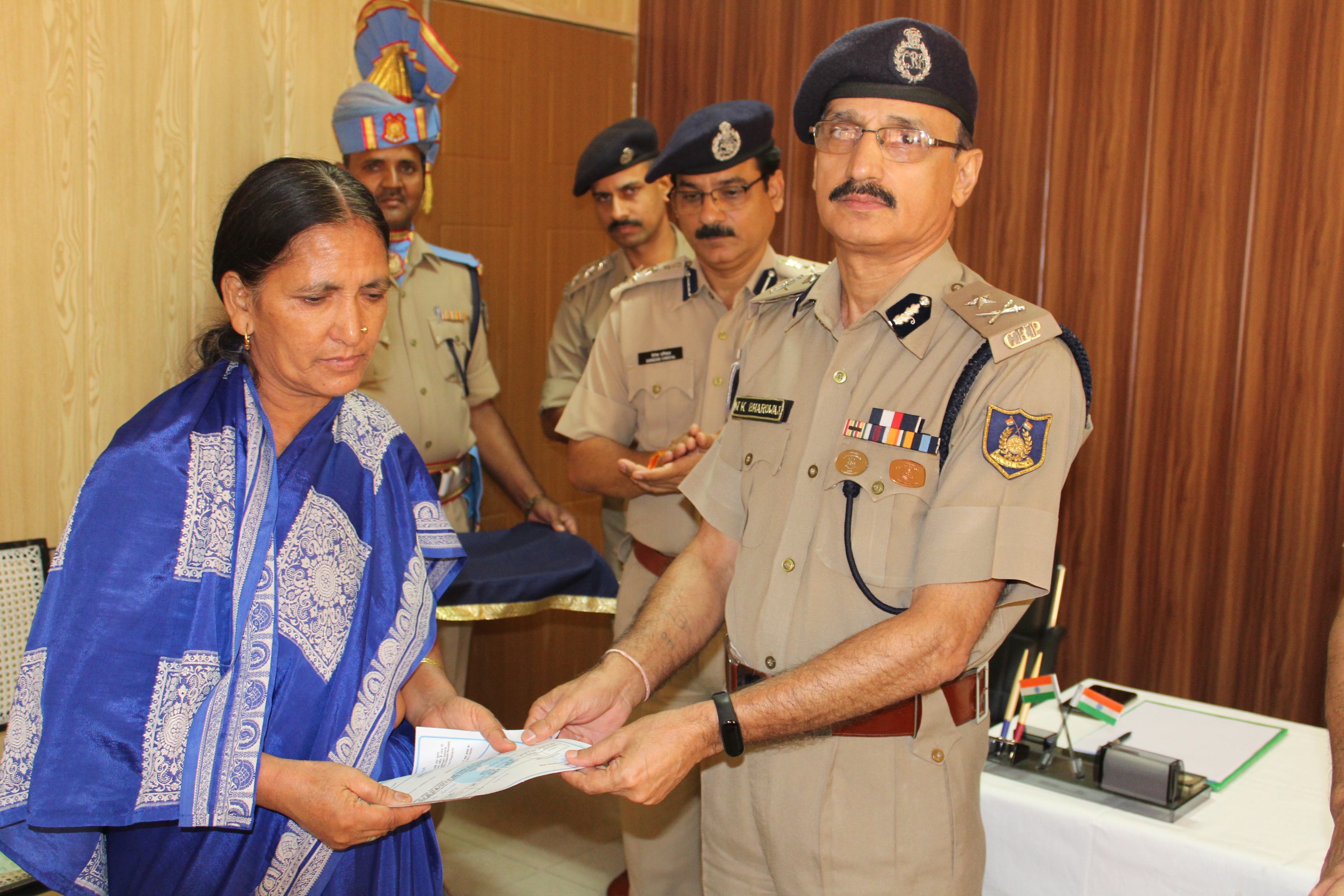   Cheques to Martyr's Family